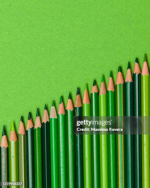 green colored pencils. - colored pencil stock pictures, royalty-free photos & images