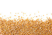 Mustard seeds on a white background. The view from top