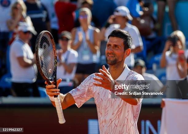 Novak Djokovic of Serbia celebrates after the match against Alexander Zverev of Germany at the Adria Tour charity exhibition tournament hosted by...