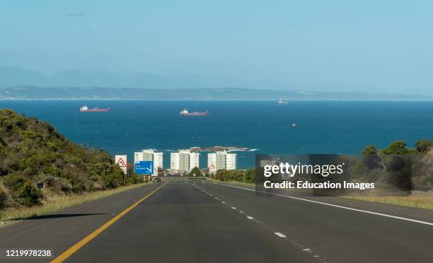 Mossel Bay, Western Cape, South Africa, The N2 highway approaching Mussel Bay and the Indian Ocean. Exit sign for Hartenbos.