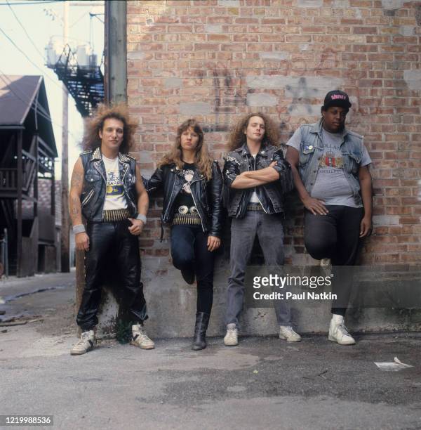 Portrait of the members of American Heavy Metal band Znowhite as they pose on s sidewalk, Chicago, Illinois, September 18, 1987. Pictured are, from...
