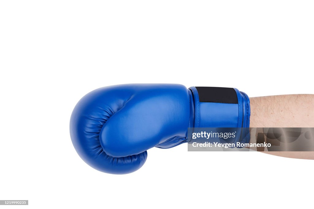 Blue boxing glove on men's hand isolated on white