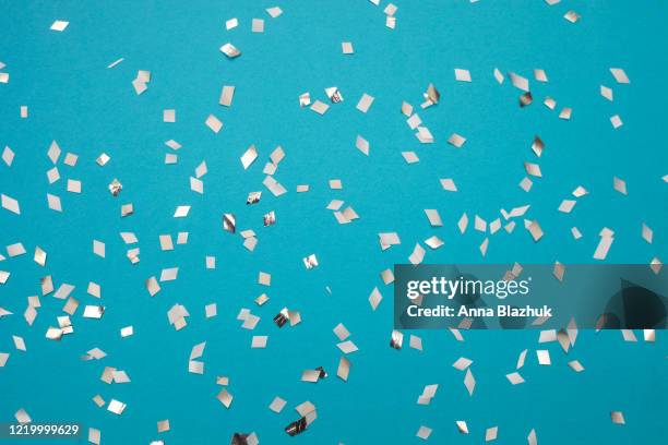 modern glitter background confetti, abstract background, glitter texture. confetti background. blue and silver. - silver colored stock-fotos und bilder