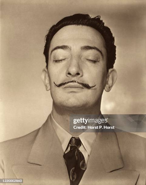 Vogue, 1943 - Portrait of artist Salvador Dali with his eyes closed, 1943.