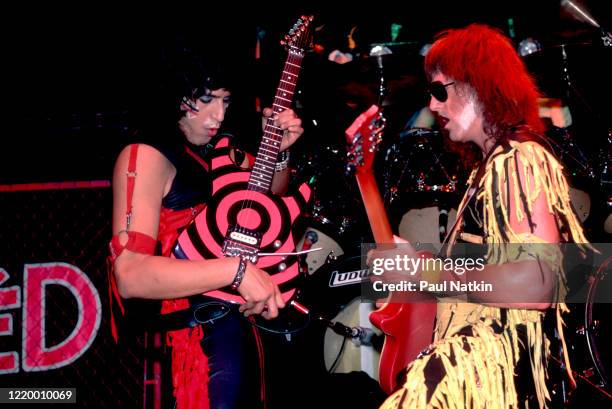 American Heavy Metal musicians Eddie Ojeda and Jay Jay French, of the group Twisted Sister, perform onstage at the Poplar Creek Music Theater,...
