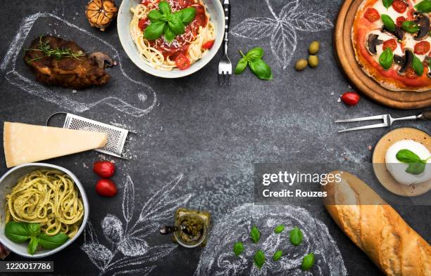 italian food with ingredients and copy space - chalk rock stock pictures, royalty-free photos & images