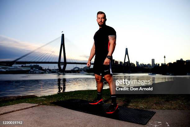 Dancer, instructor and musical theatre performer Heath Keating poses on the shoreline at Blackwattle Bay on April 21, 2020 in Sydney, Australia. With...