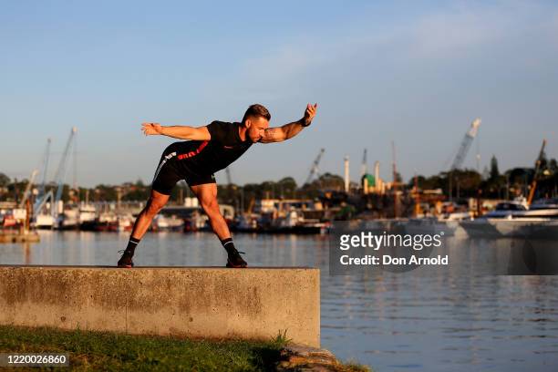 Dancer Heath Keating is seen recording a dance/fitness routine on the shoreline at Blackwattle Bay on April 21, 2020 in Sydney, Australia. Prime...