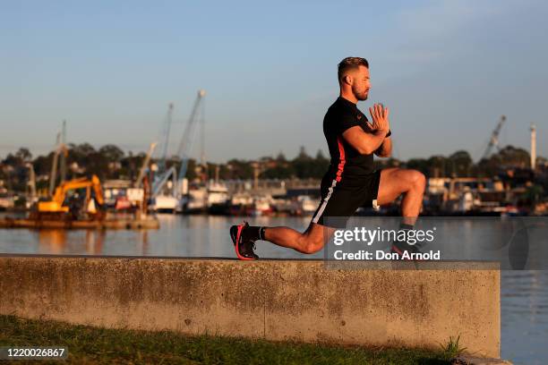 Dancer Heath Keating is seen recording a dance/fitness routine on the shoreline at Blackwattle Bay on April 21, 2020 in Sydney, Australia. Prime...