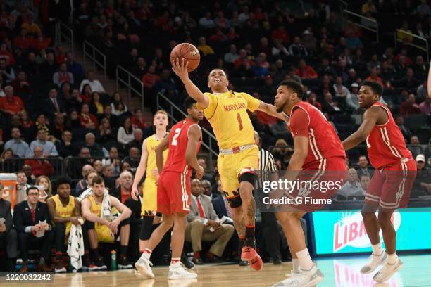 Anthony Cowan Jr. #1 of the Maryland Terrapins drives to the hoop against the Wisconsin Badgers at Madison Square Garden on March 1, 2018 in New York...