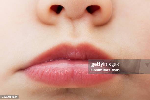 close-up of baby boy mouth - extreme close up baby stock pictures, royalty-free photos & images