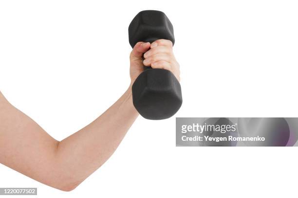 hand holding black dumbbell isolated on white - mass unit of measurement stock pictures, royalty-free photos & images
