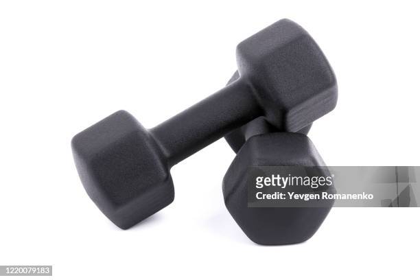 black dumbbells for fitness isolated on white background - mass unit of measurement stock pictures, royalty-free photos & images