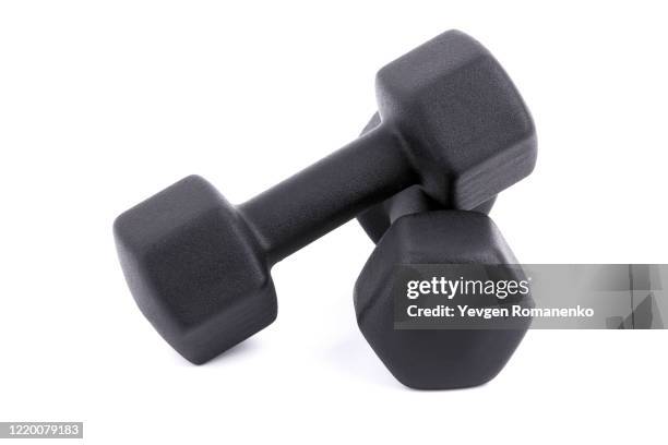 black dumbbells for fitness isolated on white background - weights - fotografias e filmes do acervo