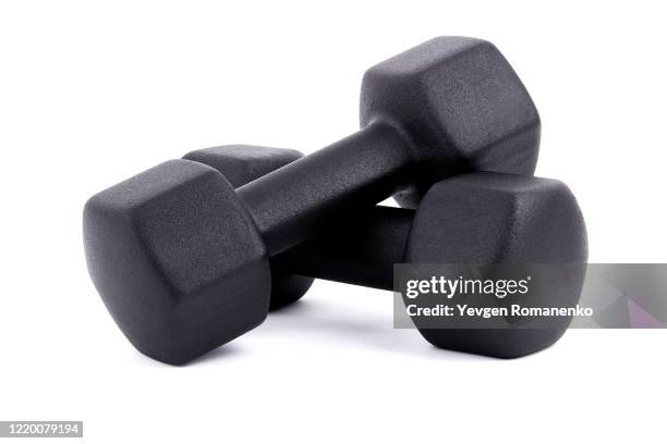 black dumbbells for fitness isolated on white background - dumbells isolated stock pictures, royalty-free photos & images