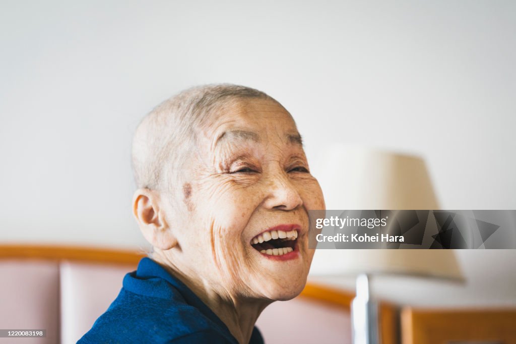 Portrait of senior woman with cancer