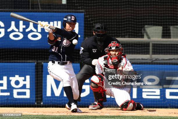 Chung Soo-bin of Doosan Bears bats during the preseason game between LG Twins and Doosan Bears at Jamsil Baseball Stadium on April 21, 2020 in Seoul,...