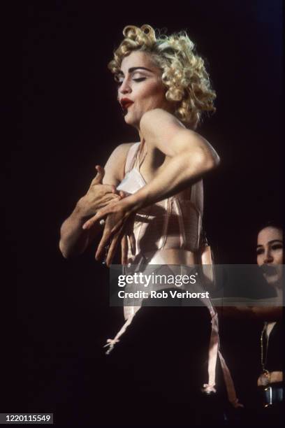 Madonna performs on stage at Feyenoord Stadium, Kuip, Rotterdam, Netherlands on the Blond Ambition World Tour, 24th July 1990.