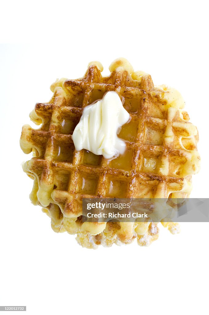 Waffles with golden syrup and butter