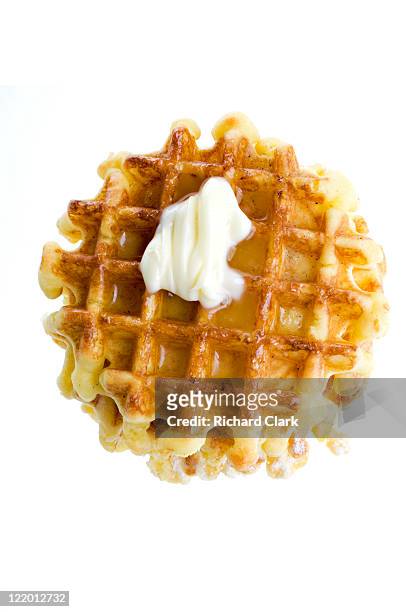 waffles with golden syrup and butter - waffles stock pictures, royalty-free photos & images