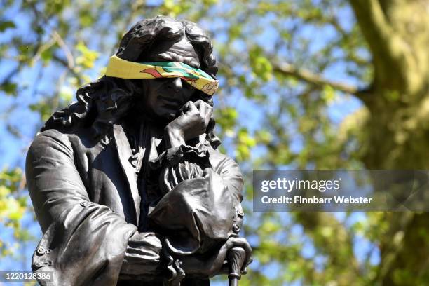 The statue to Edward Colston is seen with a blindfold on April 21, 2020 in Bristol, United Kingdom. The British government has extended the lockdown...