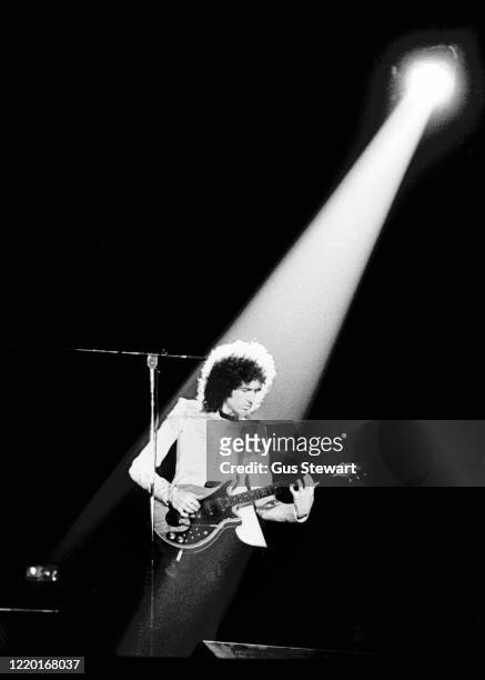 Brian May of Queen performs on stage at Wembley Arena, London, 11th May 1978.
