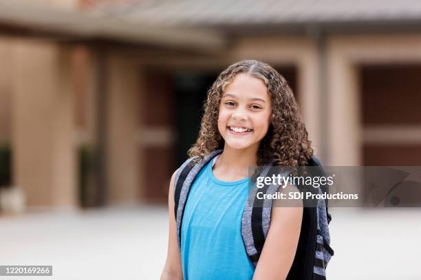 portrait of cute preteen schoolgirl - junior high student stock pictures, royalty-free photos & images