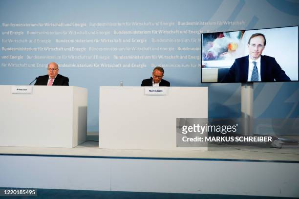 German Economy Minister Peter Altmaier , and state secretary at the economic ministry Ulrich Nussbaum attend a news conference with CureVac CEO...