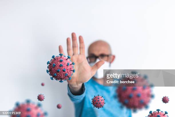 stop the coronavirus message - virus organism stock pictures, royalty-free photos & images