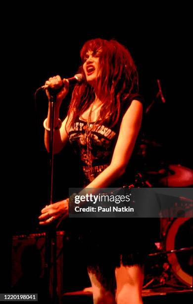 American Punk and Rock singer Exene Cervenka, of the group X, performs onstage at Tuts, Chicago, Illinois, October 23, 1983.