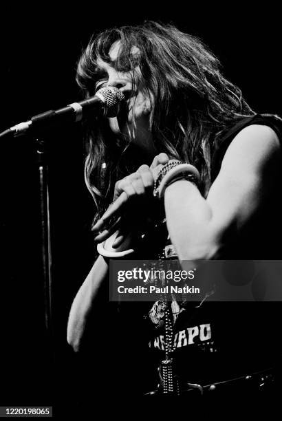 American Punk and Rock singer Exene Cervenka, of the group X, performs onstage at Tuts, Chicago, Illinois, October 23, 1983.