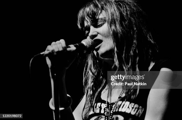 American Punk and Rock singer Exene Cervenka, of the group X, performs onstage at Tuts, Chicago, Illinois, October 23, 1983.