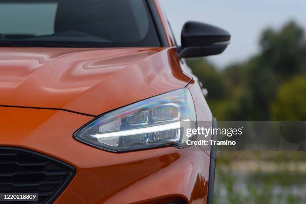 led headlight with blinker in a car - car blinker stock pictures, royalty-free photos & images