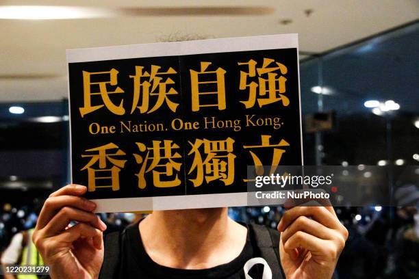 Protesters regularly chanted 'Hong Kong, One Nation' during a memorial demonstration in Pacific Place Mall, Admiralty, Hong Kong, June 15th 2020