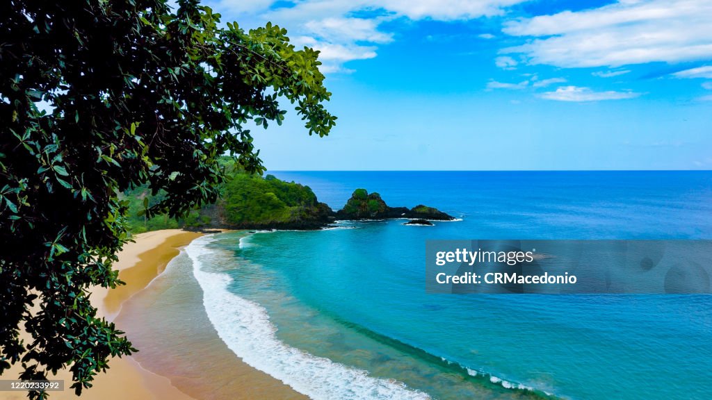 Sunny day, warm water, delicious sand. All the best. This is Sancho beach in Fernando de Noronha, PE, Brazil.