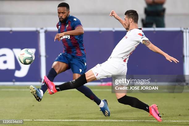 Levante's Portuguese forward Hernani Fortes vies with Sevilla's Spanish defender Sergio Escudero during the Spanish League football match between...