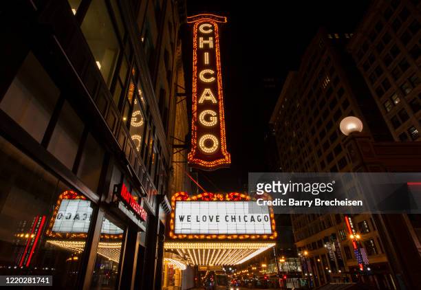 The iconic Chicago Theater shows a sign that reads "We Love Chicago" during the "stay at home" order amid the COVID-19 pandemic on April 21, 2020 in...