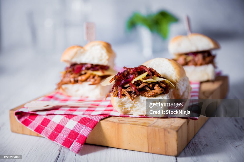 Mini beef sliders served with cheese and beetroot