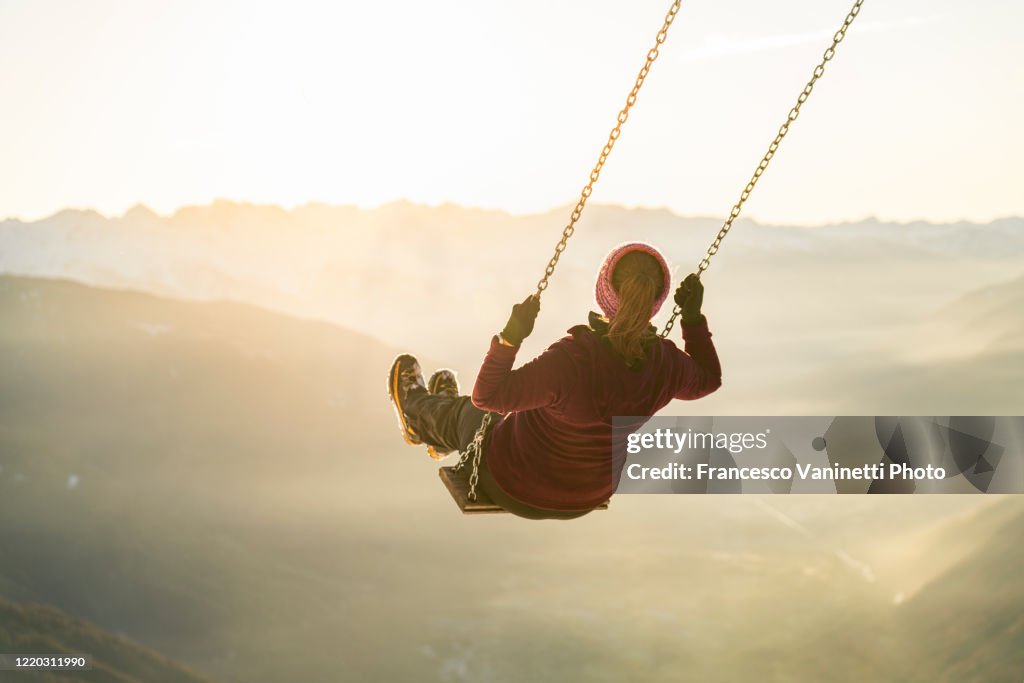 Woman on a swing.