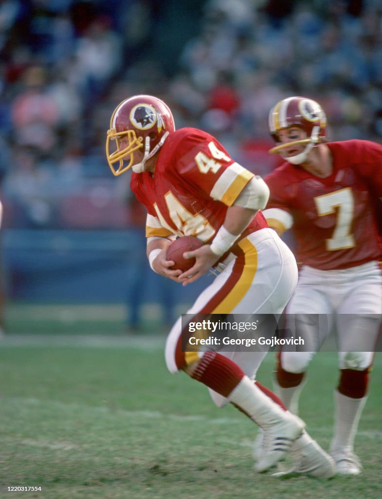 44 Redskins John Riggins Running back John Riggins of the Washington Redskins takes a handoff ...