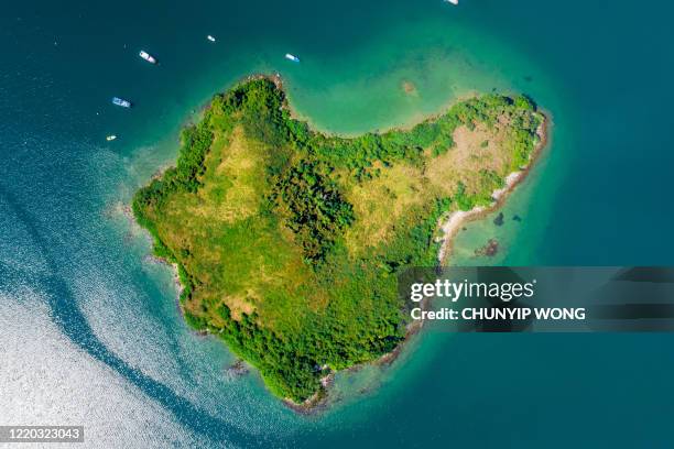 aerial view of sandy beach with clear turquoise water - small stock pictures, royalty-free photos & images