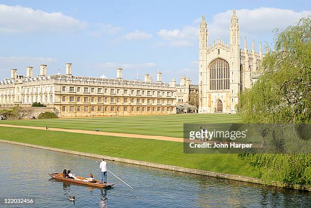 punting down the thames by kings college, cambridge, u.k - cambridge england stock pictures, royalty-free photos & images