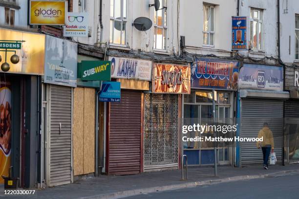 Closed shops on Cowbridge Road East during the coronavirus lockdown period on April 21, 2020 in Cardiff, United Kingdom.The British government has...