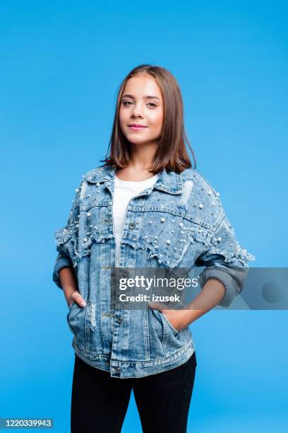 confident female high school student - hands in pockets stock pictures, royalty-free photos & images