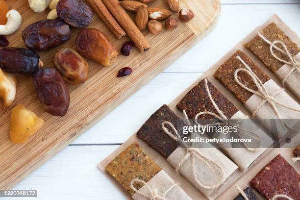 home made healthy protein bars on a table - dates fruit stock pictures, royalty-free photos & images