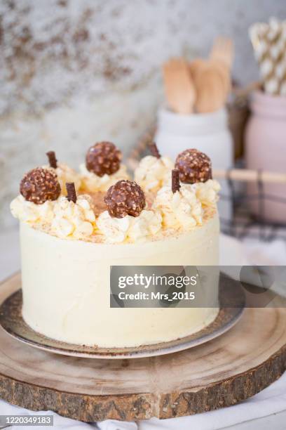 buttercream layer cake with white chocolate and milk chocolate - layer cake stock pictures, royalty-free photos & images