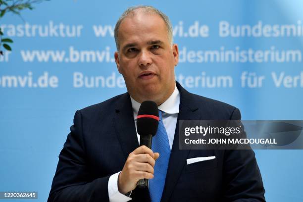 German Dr Dirk Woessner, member of the Board of Management of Deutsche Telekom speaks during a press conference on the mobile communication summit on...