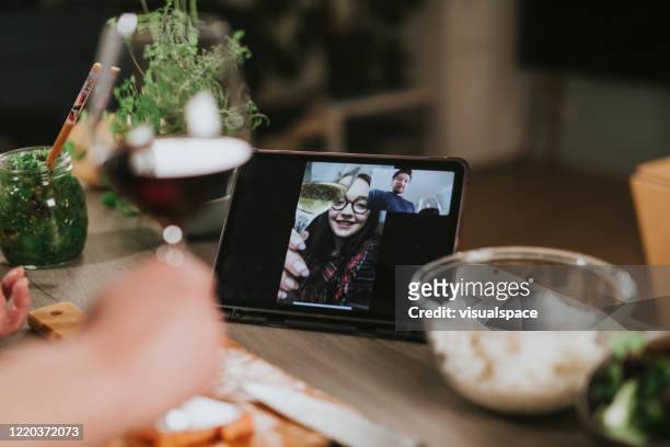 Single man is having a romantic dinner with video call during lockdown