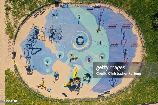 Drifting sand begins to take over a children's park during the pandemic lockdown on April 22, 2020 in Rhyl, Wales. The British government has...