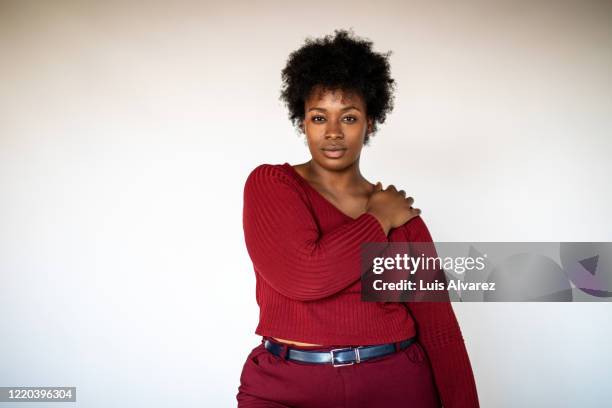 african american woman against white background - curvy black women stock-fotos und bilder